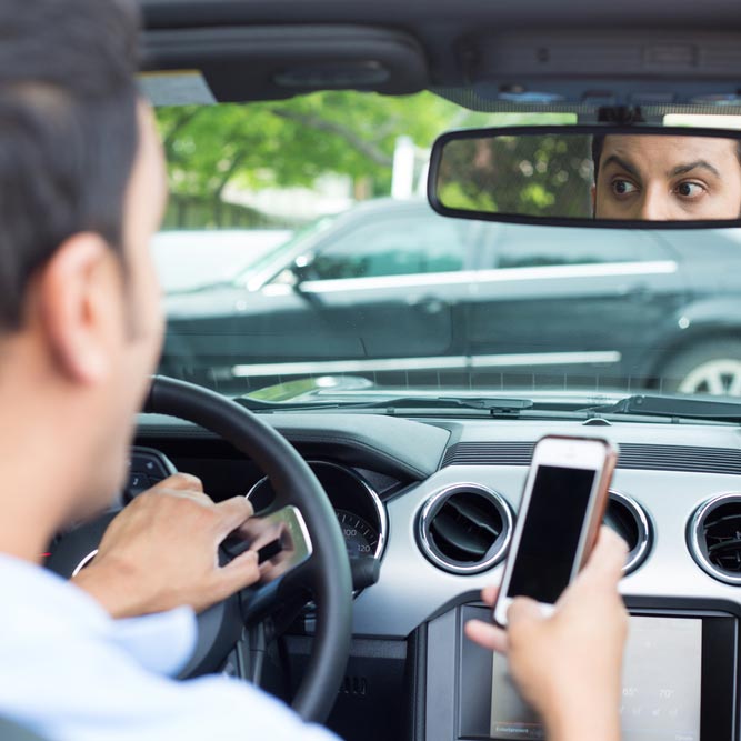 Distracted driver on cell phone